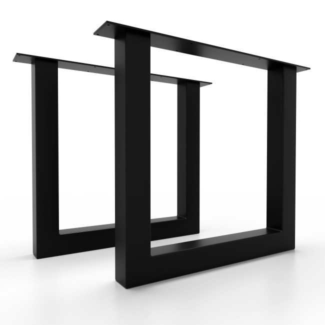 Tavolo con gambe robuste in ferro nero, perfetto per ambienti industrial chic.